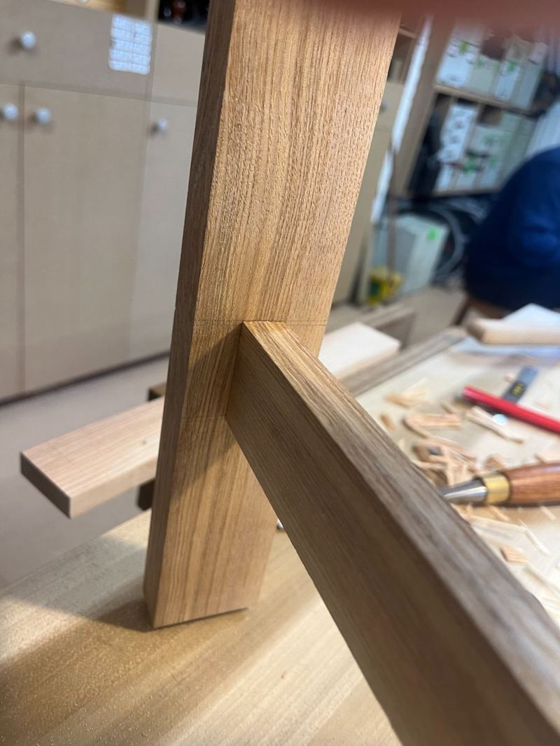 Halving joint at the cross-stretcher — cut and fitted by hand, tight and flush