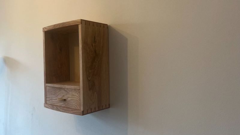 Left-angle view — half-blind dovetails at the corner