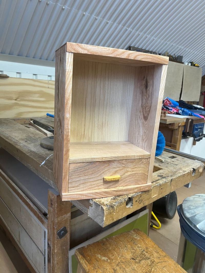 Front view at LSF — piston-fit drawer with satinwood handle