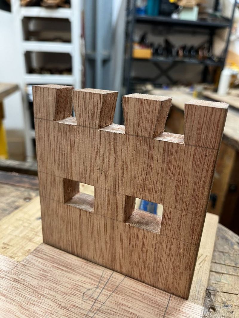 Complex joinery sample — dovetails, tenons and housings in a single piece
